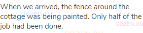 When we arrived, the fence around the cottage was being painted. Only half of the job had been done.