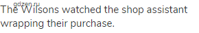 The Wilsons watched the shop assistant wrapping their purchase.